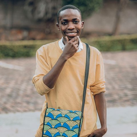 Portrait of Jeff Conner, a young man in a yellow shirt (stock placeholder photo)